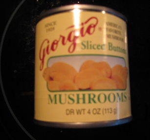 Can of sliced mushrooms