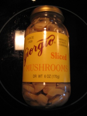 Jar of sliced mushrooms